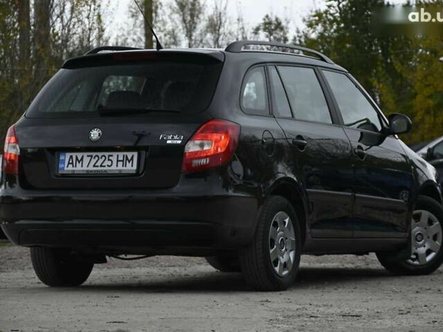 Черный Шкода Фабия, объемом двигателя 1.4 л и пробегом 205 тыс. км за 5600 $, фото 16 на Automoto.ua