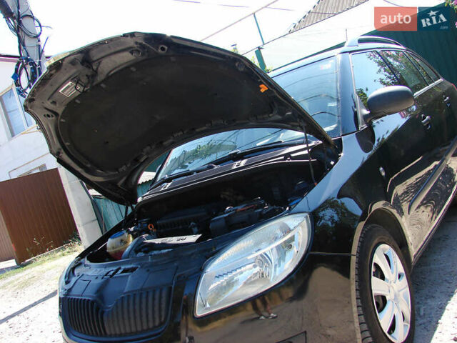 Черный Шкода Фабия, объемом двигателя 1.4 л и пробегом 190 тыс. км за 5500 $, фото 18 на Automoto.ua