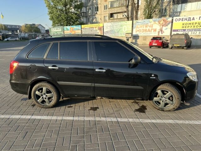 Черный Шкода Фабия, объемом двигателя 1.2 л и пробегом 193 тыс. км за 4200 $, фото 1 на Automoto.ua
