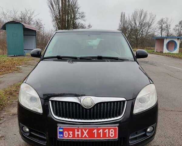 Черный Шкода Фабия, объемом двигателя 1.4 л и пробегом 201 тыс. км за 5750 $, фото 8 на Automoto.ua