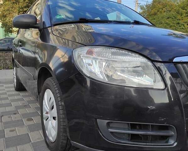 Чорний Шкода Фабія, об'ємом двигуна 1.39 л та пробігом 163 тис. км за 4600 $, фото 9 на Automoto.ua