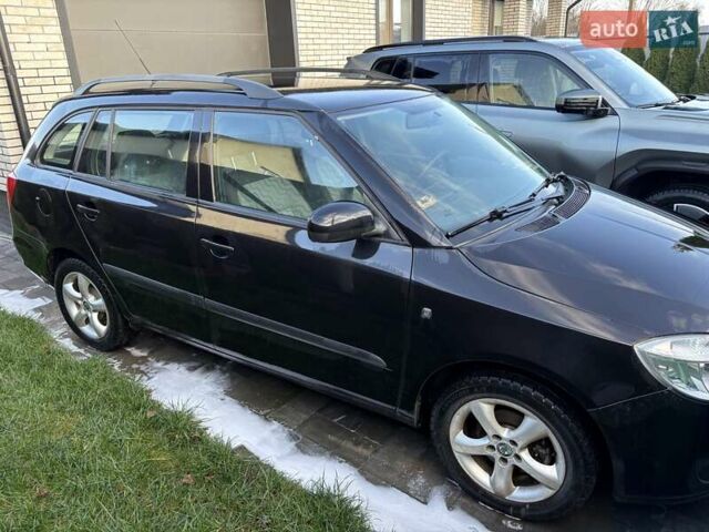 Черный Шкода Фабия, объемом двигателя 1.2 л и пробегом 264 тыс. км за 4250 $, фото 3 на Automoto.ua