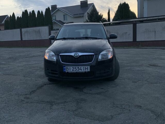 Черный Шкода Фабия, объемом двигателя 1.4 л и пробегом 228 тыс. км за 6999 $, фото 2 на Automoto.ua