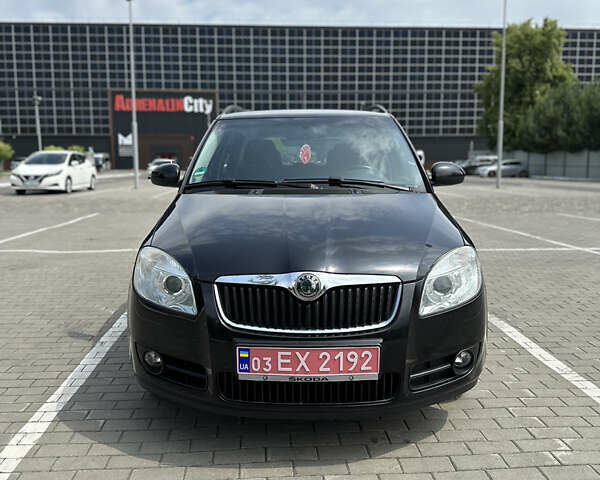 Черный Шкода Фабия, объемом двигателя 1.39 л и пробегом 225 тыс. км за 5650 $, фото 2 на Automoto.ua