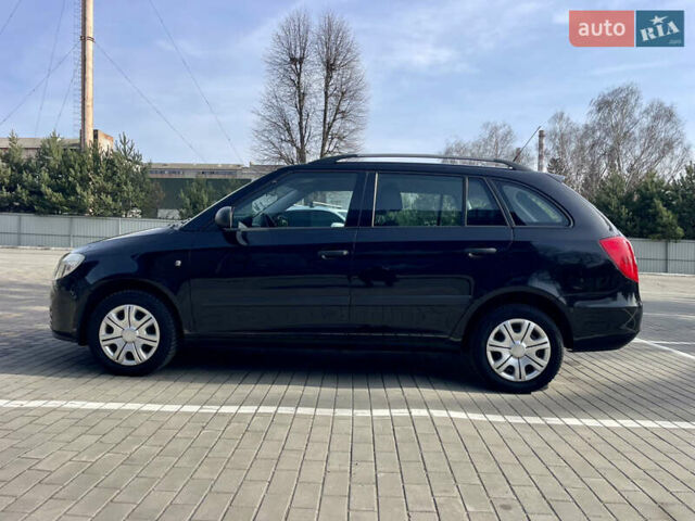Черный Шкода Фабия, объемом двигателя 1.39 л и пробегом 180 тыс. км за 5000 $, фото 10 на Automoto.ua