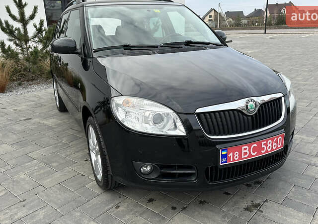 Черный Шкода Фабия, объемом двигателя 1.6 л и пробегом 205 тыс. км за 5800 $, фото 8 на Automoto.ua