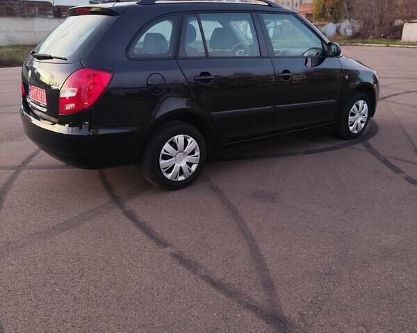 Черный Шкода Фабия, объемом двигателя 1.4 л и пробегом 197 тыс. км за 5800 $, фото 11 на Automoto.ua