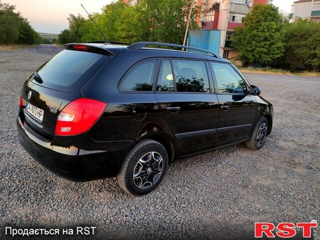 Черный Шкода Фабия, объемом двигателя 1.4 л и пробегом 250 тыс. км за 4900 $, фото 6 на Automoto.ua