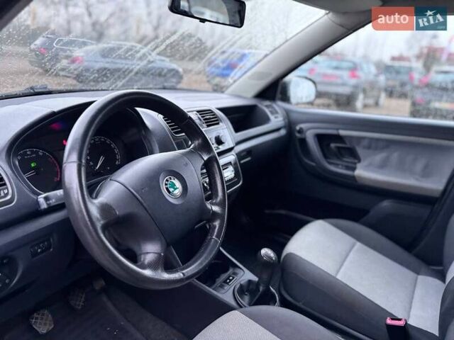 Черный Шкода Фабия, объемом двигателя 1.39 л и пробегом 207 тыс. км за 5799 $, фото 11 на Automoto.ua