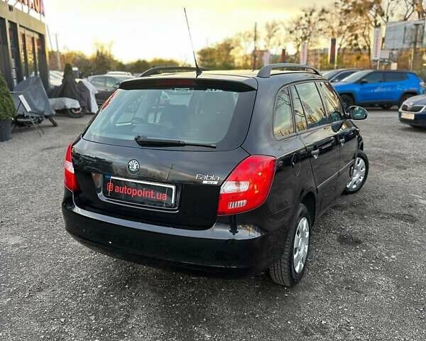 Черный Шкода Фабия, объемом двигателя 1.39 л и пробегом 172 тыс. км за 5999 $, фото 7 на Automoto.ua