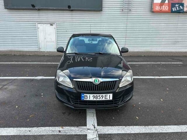 Черный Шкода Фабия, объемом двигателя 1.6 л и пробегом 195 тыс. км за 5500 $, фото 3 на Automoto.ua