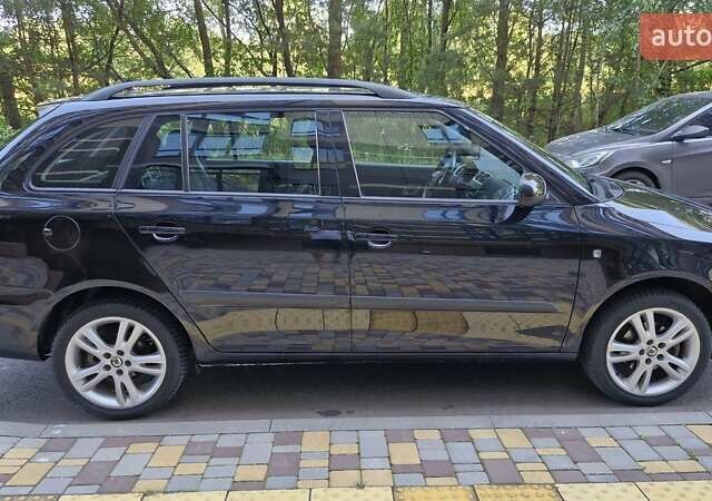 Черный Шкода Фабия, объемом двигателя 1.6 л и пробегом 175 тыс. км за 6450 $, фото 11 на Automoto.ua