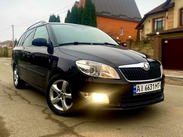 Черный Шкода Фабия, объемом двигателя 1.2 л и пробегом 243 тыс. км за 5300 $, фото 2 на Automoto.ua