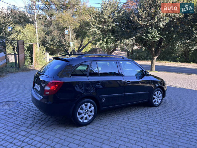 Черный Шкода Фабия, объемом двигателя 1.6 л и пробегом 275 тыс. км за 4350 $, фото 5 на Automoto.ua