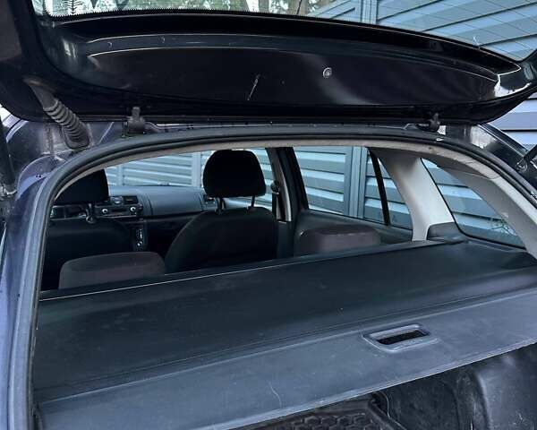 Черный Шкода Фабия, объемом двигателя 1.2 л и пробегом 295 тыс. км за 4900 $, фото 1 на Automoto.ua