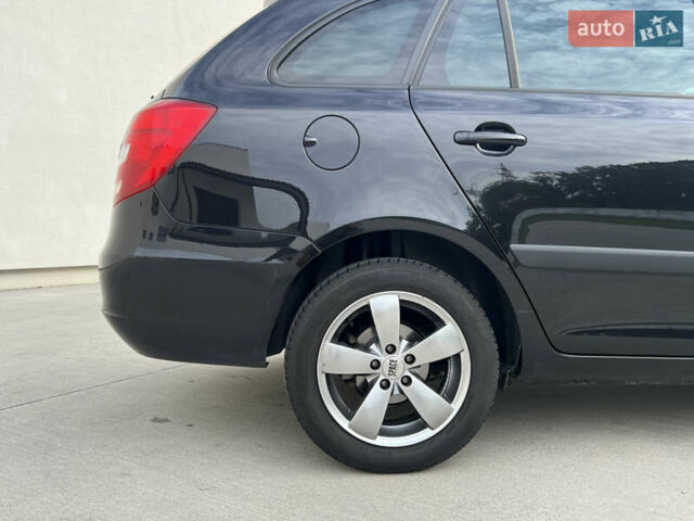 Шкода Фабия 2010 в Луцке на Automoto.ua Черный Шкода Фабия, объемом двигателя 1.2 л и пробегом 141 тыс. км за 6850 $, фото 49 на Automoto.ua