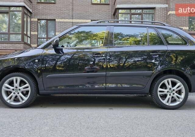 Черный Шкода Фабия, объемом двигателя 1.6 л и пробегом 175 тыс. км за 6450 $, фото 5 на Automoto.ua