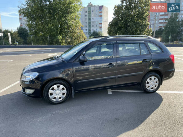 Черный Шкода Фабия, объемом двигателя 1.2 л и пробегом 331 тыс. км за 4500 $, фото 3 на Automoto.ua