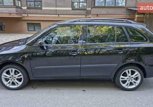 Черный Шкода Фабия, объемом двигателя 1.6 л и пробегом 175 тыс. км за 6450 $, фото 4 на Automoto.ua