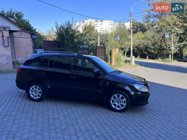 Черный Шкода Фабия, объемом двигателя 1.6 л и пробегом 275 тыс. км за 4350 $, фото 4 на Automoto.ua