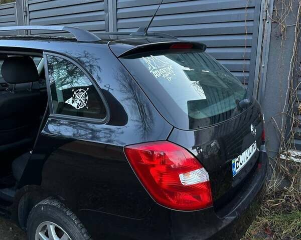 Черный Шкода Фабия, объемом двигателя 1.2 л и пробегом 295 тыс. км за 4900 $, фото 3 на Automoto.ua