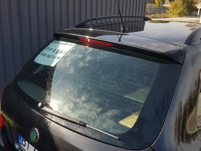 Черный Шкода Фабия, объемом двигателя 1 л и пробегом 220 тыс. км за 4200 $, фото 1 на Automoto.ua