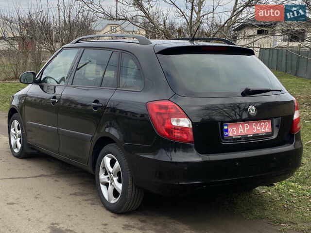 Черный Шкода Фабия, объемом двигателя 1.6 л и пробегом 197 тыс. км за 6100 $, фото 3 на Automoto.ua
