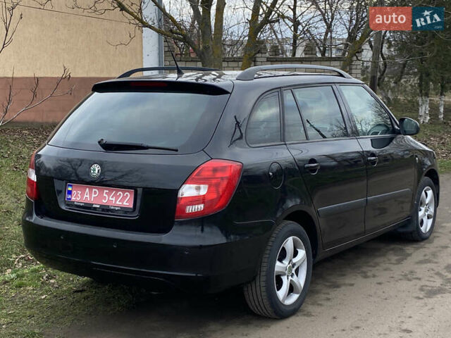 Черный Шкода Фабия, объемом двигателя 1.6 л и пробегом 197 тыс. км за 6100 $, фото 6 на Automoto.ua