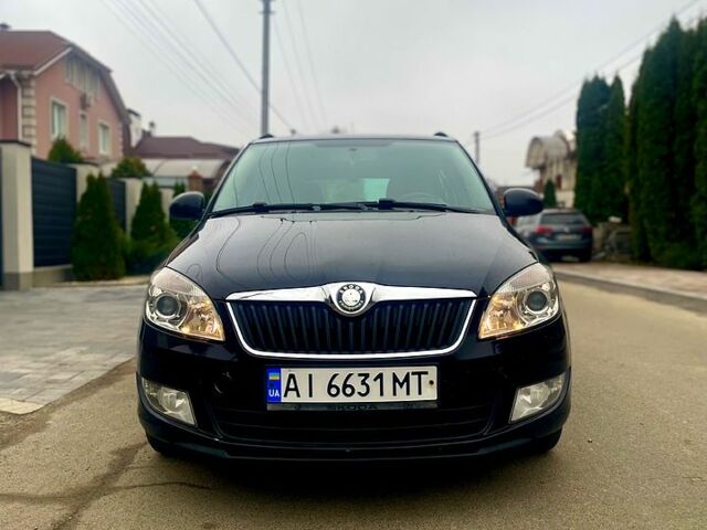 Черный Шкода Фабия, объемом двигателя 1.2 л и пробегом 243 тыс. км за 5300 $, фото 1 на Automoto.ua