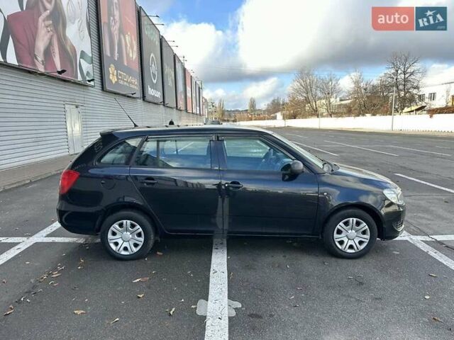 Черный Шкода Фабия, объемом двигателя 1.6 л и пробегом 195 тыс. км за 5500 $, фото 5 на Automoto.ua