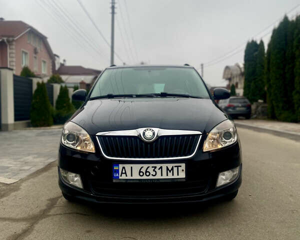 Черный Шкода Фабия, объемом двигателя 1.2 л и пробегом 243 тыс. км за 5300 $, фото 1 на Automoto.ua