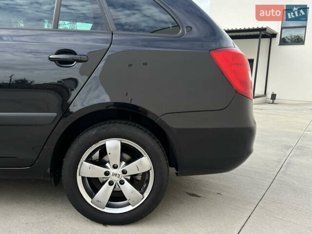 Шкода Фабия 2010 в Луцке на Automoto.ua Черный Шкода Фабия, объемом двигателя 1.2 л и пробегом 141 тыс. км за 6850 $, фото 42 на Automoto.ua