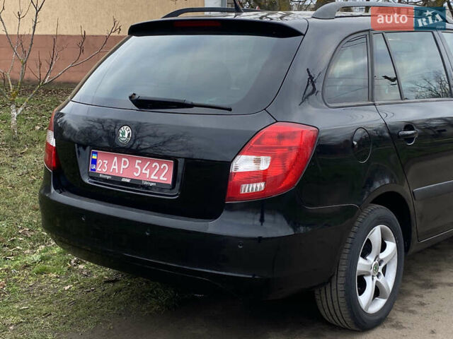 Черный Шкода Фабия, объемом двигателя 1.6 л и пробегом 197 тыс. км за 6100 $, фото 5 на Automoto.ua