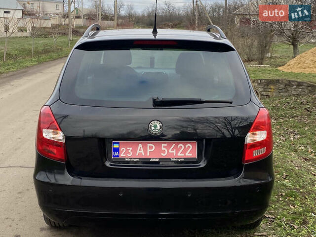 Черный Шкода Фабия, объемом двигателя 1.6 л и пробегом 197 тыс. км за 6100 $, фото 4 на Automoto.ua