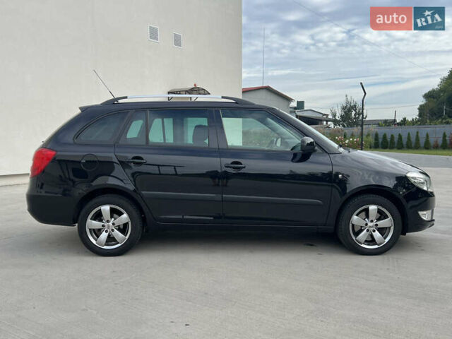 Шкода Фабия 2010 в Луцке на Automoto.ua Черный Шкода Фабия, объемом двигателя 1.2 л и пробегом 141 тыс. км за 6850 $, фото 6 на Automoto.ua