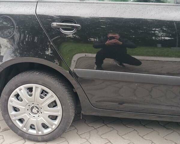 Черный Шкода Фабия, объемом двигателя 1.39 л и пробегом 210 тыс. км за 5400 $, фото 5 на Automoto.ua