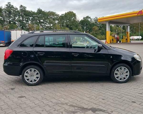 Черный Шкода Фабия, объемом двигателя 1.39 л и пробегом 210 тыс. км за 5400 $, фото 13 на Automoto.ua