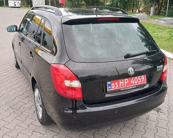 Черный Шкода Фабия, объемом двигателя 1.39 л и пробегом 210 тыс. км за 5400 $, фото 11 на Automoto.ua