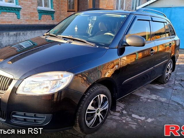 Черный Шкода Фабия, объемом двигателя 1.2 л и пробегом 204 тыс. км за 5300 $, фото 1 на Automoto.ua