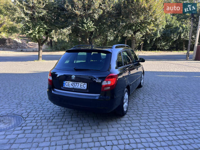 Черный Шкода Фабия, объемом двигателя 1.6 л и пробегом 275 тыс. км за 4350 $, фото 7 на Automoto.ua