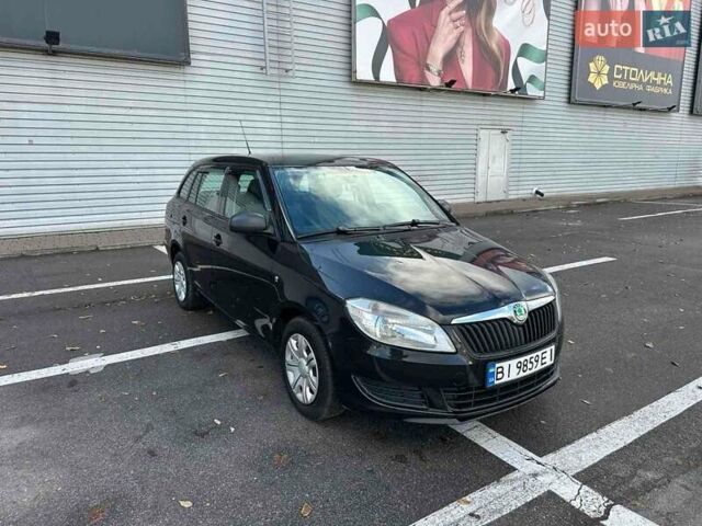Черный Шкода Фабия, объемом двигателя 1.6 л и пробегом 195 тыс. км за 5500 $, фото 2 на Automoto.ua