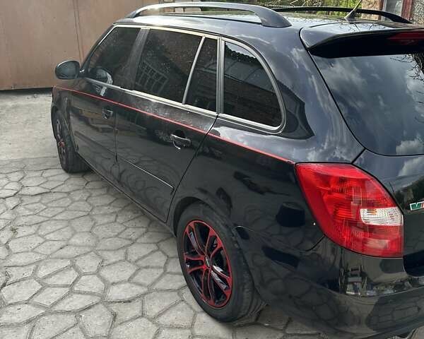 Черный Шкода Фабия, объемом двигателя 1.4 л и пробегом 215 тыс. км за 7300 $, фото 4 на Automoto.ua