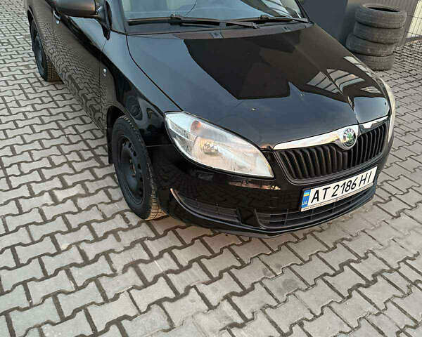 Черный Шкода Фабия, объемом двигателя 1.6 л и пробегом 335 тыс. км за 5000 $, фото 2 на Automoto.ua
