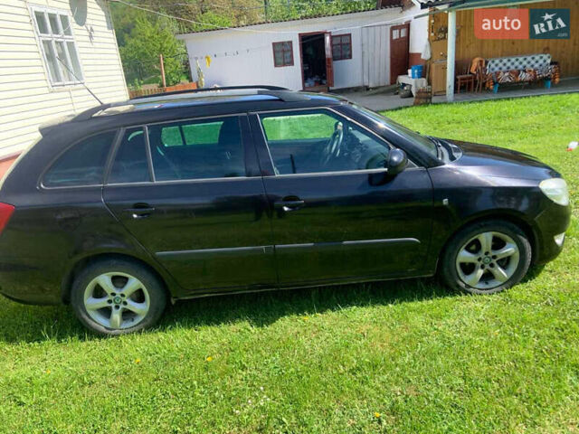 Черный Шкода Фабия, объемом двигателя 1.2 л и пробегом 320 тыс. км за 5200 $, фото 2 на Automoto.ua