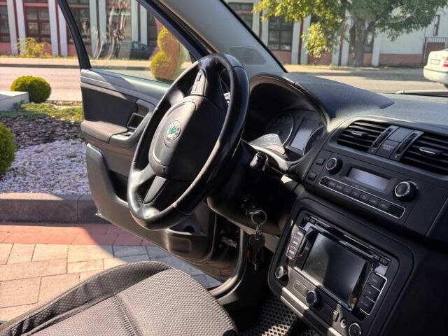 Черный Шкода Фабия, объемом двигателя 1.6 л и пробегом 295 тыс. км за 6699 $, фото 7 на Automoto.ua