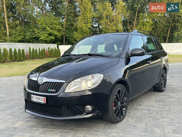 Черный Шкода Фабия, объемом двигателя 1.4 л и пробегом 179 тыс. км за 7750 $, фото 2 на Automoto.ua