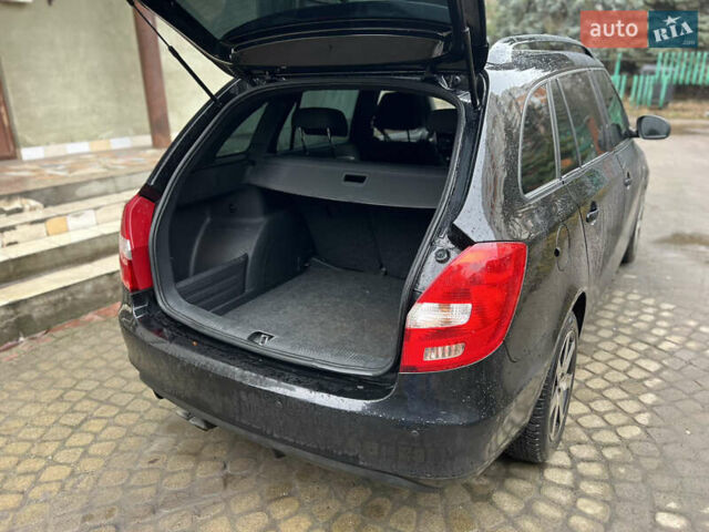 Черный Шкода Фабия, объемом двигателя 1.4 л и пробегом 260 тыс. км за 7277 $, фото 12 на Automoto.ua