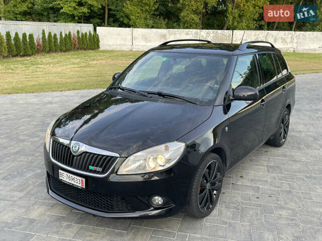 Черный Шкода Фабия, объемом двигателя 1.4 л и пробегом 179 тыс. км за 7750 $, фото 1 на Automoto.ua