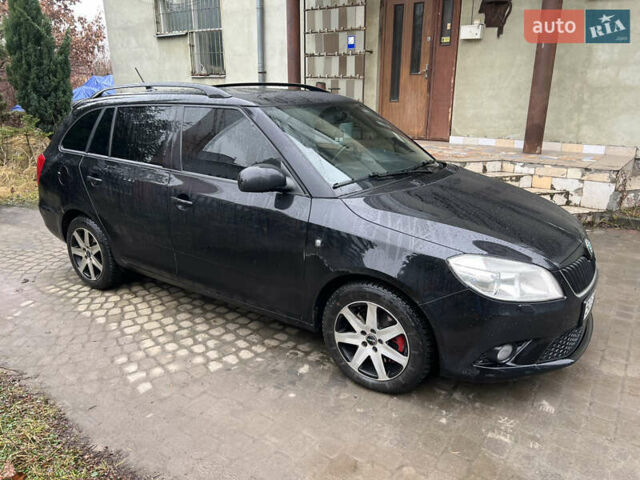Черный Шкода Фабия, объемом двигателя 1.4 л и пробегом 260 тыс. км за 7277 $, фото 2 на Automoto.ua