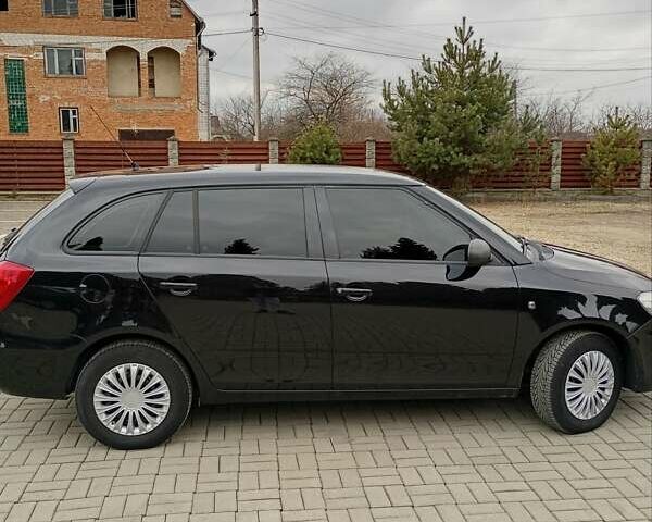 Черный Шкода Фабия, объемом двигателя 1.6 л и пробегом 221 тыс. км за 5350 $, фото 7 на Automoto.ua